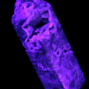 Sphalerite geode 24*89mm wand 94g in UV light - Rocks and Things Store