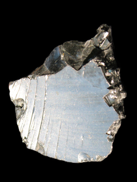 Noble Elite Shungite 18.9g in sunshine reflecting the sky