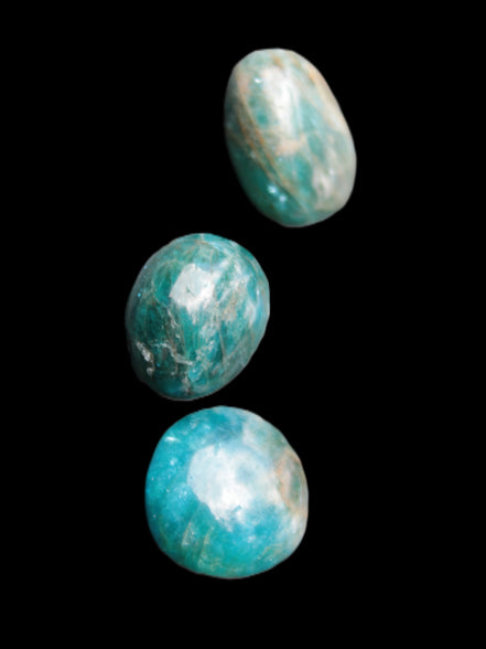 Neon Blue Apatite 3 tumbled stones 16-17g in sunlight - Rocks and Things Store