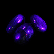 Neon Blue Apatite 3 tumbled stones 16-17g in UV light - Rocks and Things Store