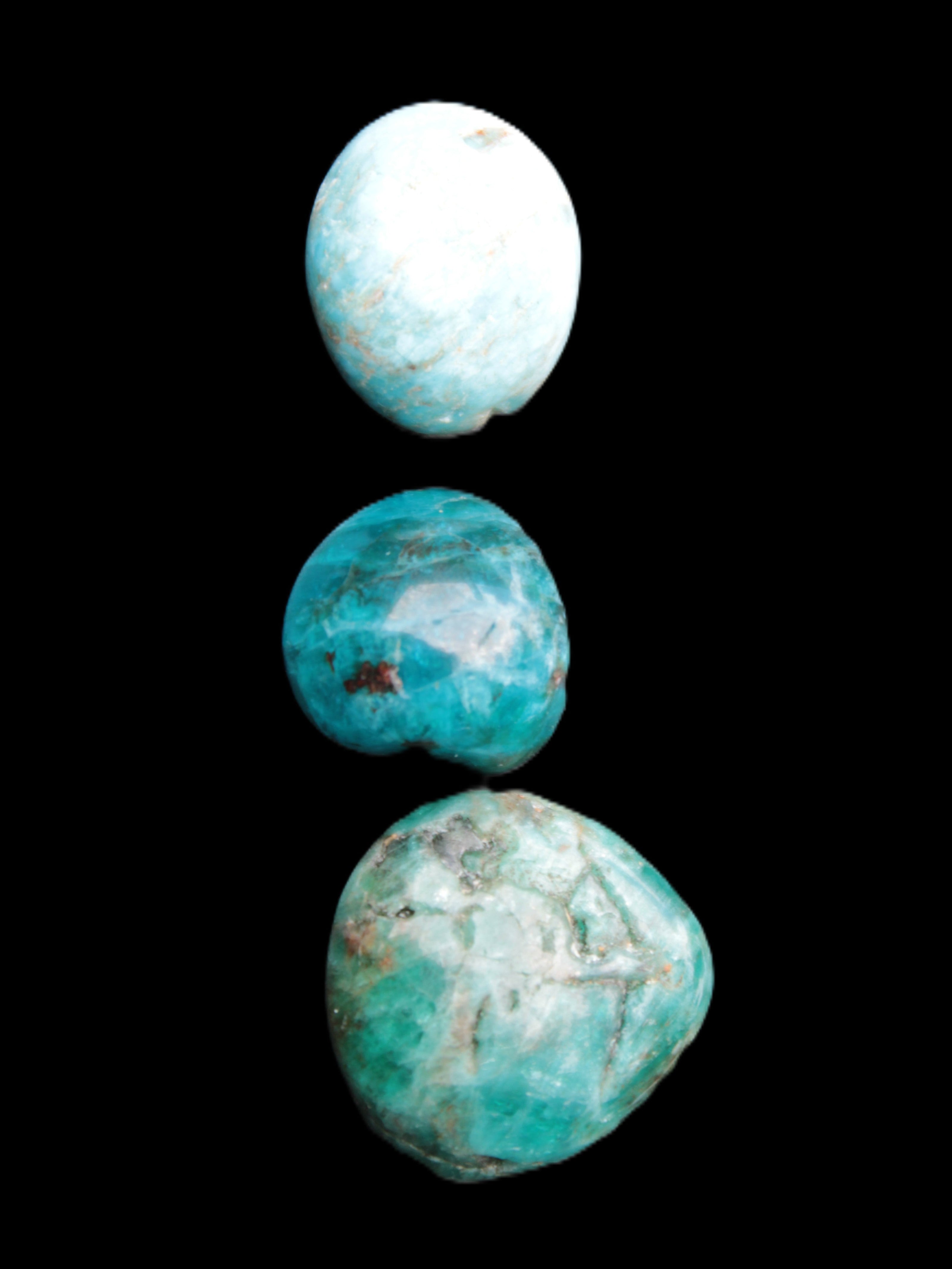 Neon Blue Apatite 3 tumbled stones 16-17g in sunlight - Rocks and Things Store