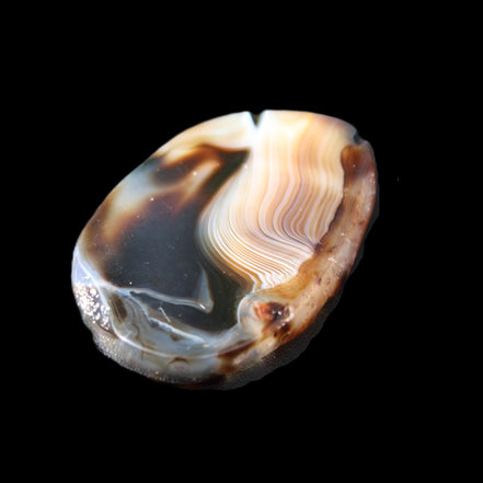 Crazy Lace Agate from Madagascar slice 47*4*29mm 15.8g in sunlight - Rocks and Things Store