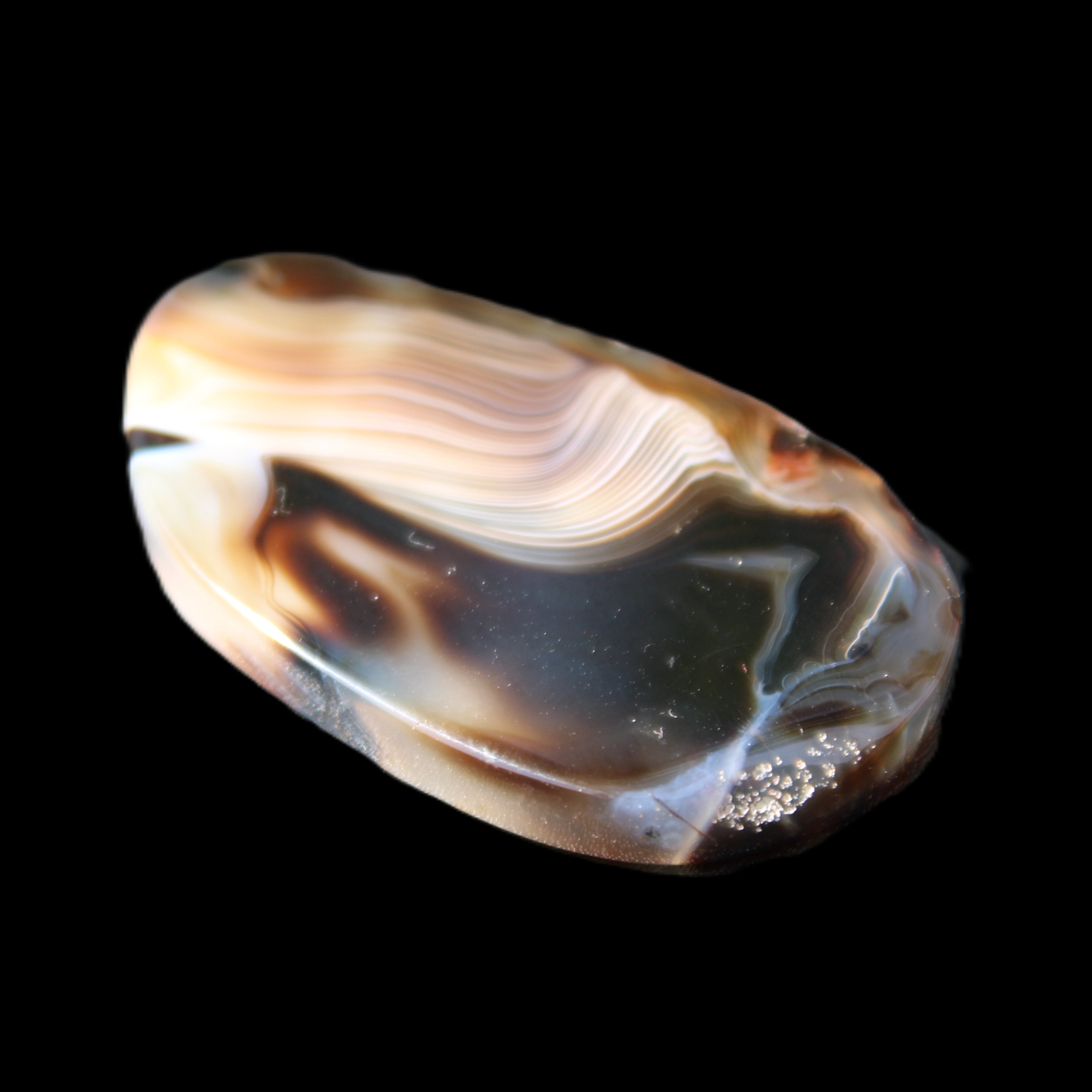 Crazy Lace Agate from Madagascar slice 47*4*29mm 15.8g in sunlight - Rocks and Things Store