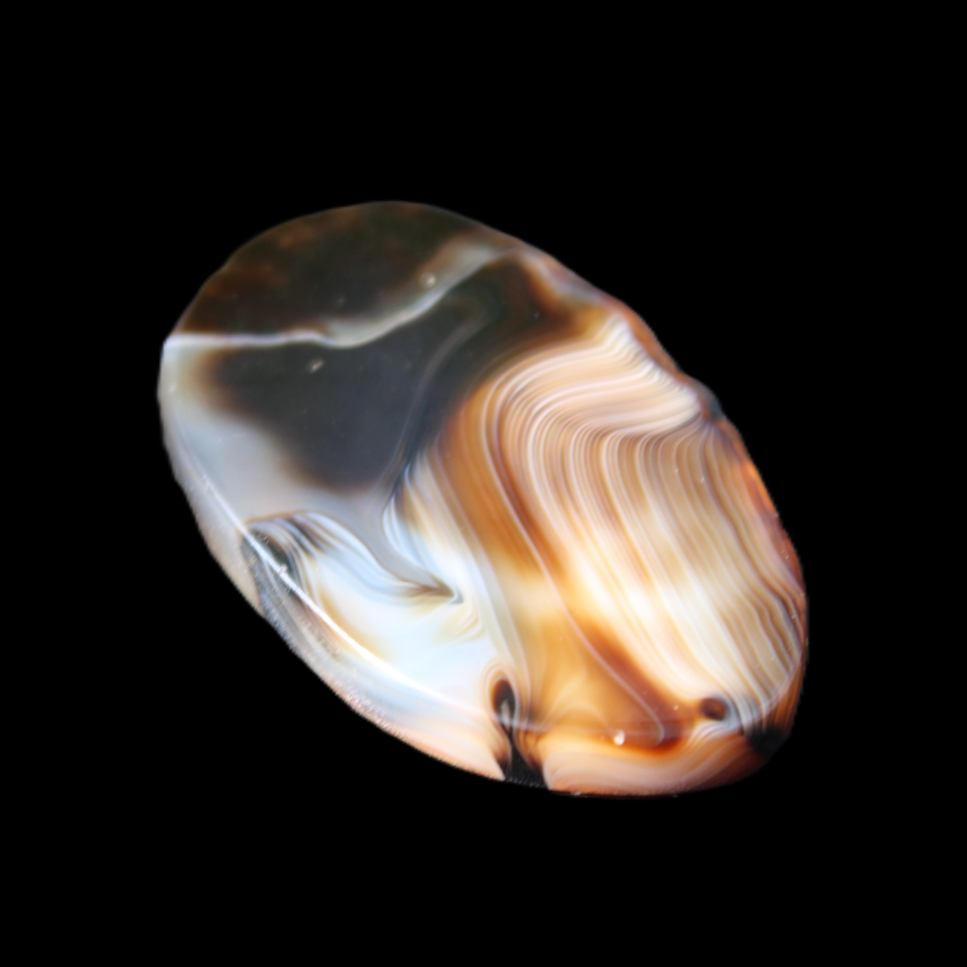 Crazy Lace Agate from Madagascar slice 47*4*29mm 15.8g in sunlight - Rocks and Things Store