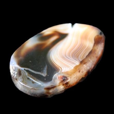 Crazy Lace Agate from Madagascar slice 47*4*29mm 15.8g in sunlight - Rocks and Things Store
