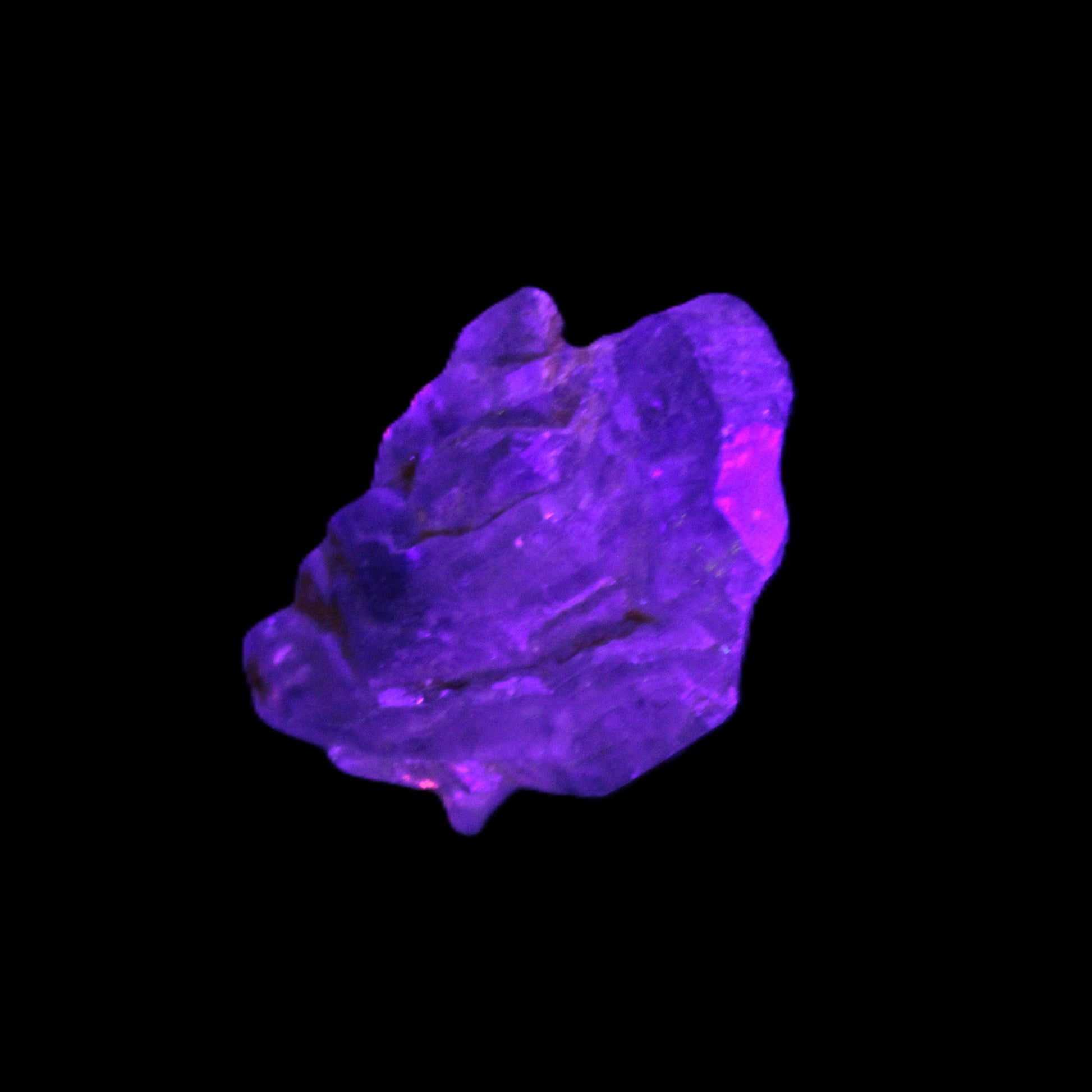 Super Seven Amethyst crystal 10g in UV light - Rocks and Things Store