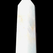 Caribbean Calcite Aragonite wand 54g in sunlight - Rocks and Things Store