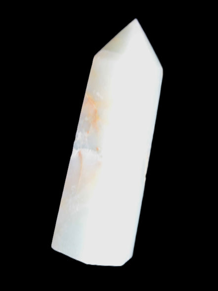 Caribbean Calcite Aragonite wand 54g in sunlight - Rocks and Things Store