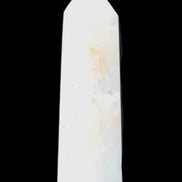 Caribbean Calcite Aragonite wand 54g in sunlight - Rocks and Things Store