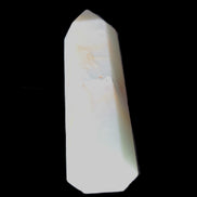 Caribbean Calcite Aragonite wand 54g in sunlight - Rocks and Things Store