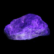 Golden Arusha Quartz 1/2 raw crystals 17-23g in UV light - Rocks and Things Store