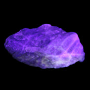 Golden Arusha Quartz 1/2 raw crystals 17-23g in UV light - Rocks and Things Store