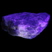 Golden Arusha Quartz 1/2 raw crystals 17-23g in UV light - Rocks and Things Store