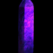 Plum Blossom Jade Rhodonite wand 93g in UV light
