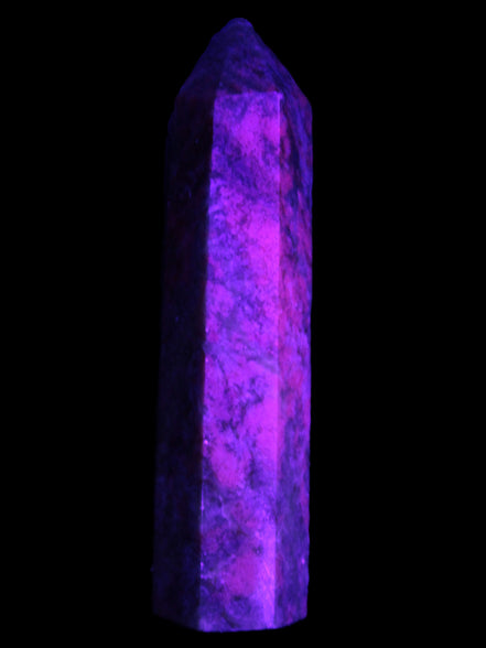 Plum Blossom Jade Rhodonite wand 93g in UV light -  Rocks and Things Store