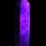 Plum Blossom Jade Rhodonite wand 93g in UV light -  Rocks and Things Store