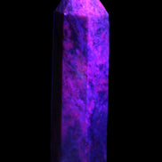 Plum Blossom Jade Rhodonite wand 93g in UV light -  Rocks and Things Store