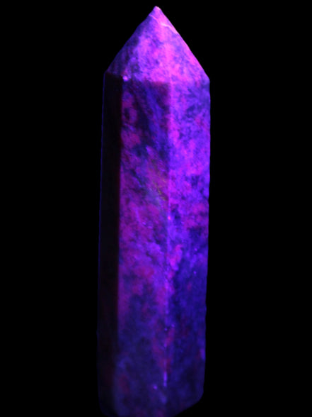 Plum Blossom Jade Rhodonite wand 93g in UV light -  Rocks and Things Store