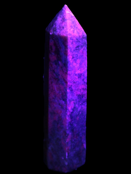 Plum Blossom Jade Rhodonite wand 93g in UV light -  Rocks and Things Store