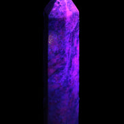 Plum Blossom Jade Rhodonite wand 93g in UV light -  Rocks and Things Store