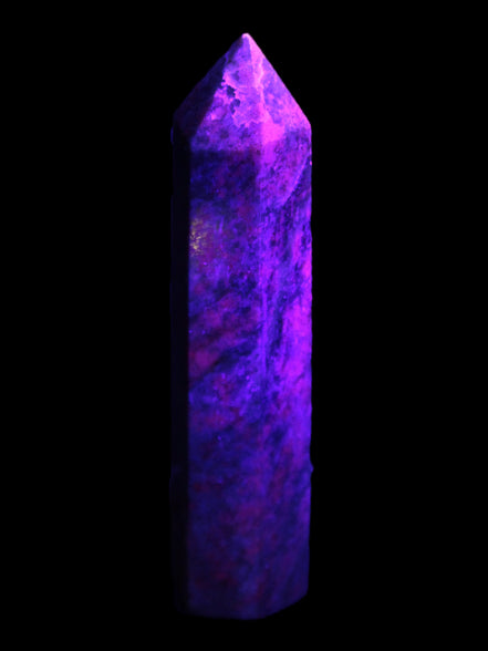 Plum Blossom Jade Rhodonite wand 93g in UV light -  Rocks and Things Store