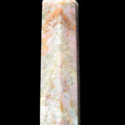 Plum Blossom Jade Rhodonite wand 93g in sunlight -  Rocks and Things Store