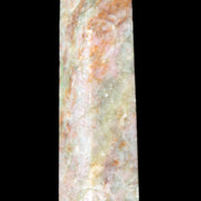 Plum Blossom Jade Rhodonite wand 93g in sunlight -  Rocks and Things Store