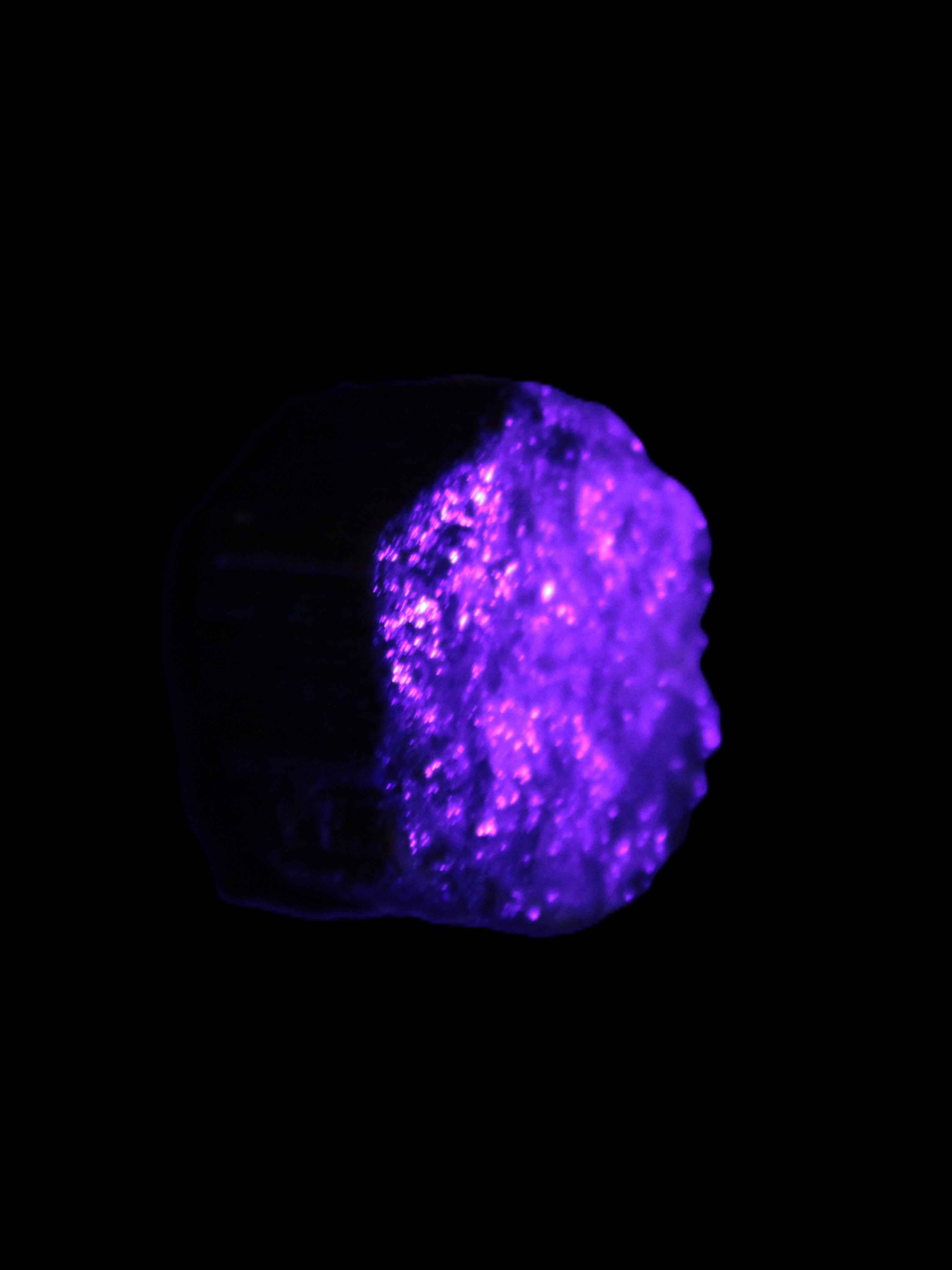 Green Tourmaline crystal 14mm 21g in UV light