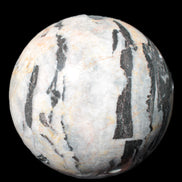 Big Zebra Stone sphere 147mm 4780g in sunlight - Rocks and Things Store