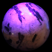 Big Zebra Stone sphere 147mm 4780g in UV light - Rocks and Things Store