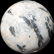 Big Zebra Stone sphere 147mm 4780g in sunlight - Rocks and Things Store