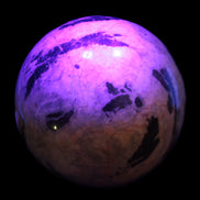 Big Zebra Stone sphere 147mm 4780g in UV light - Rocks and Things Store