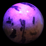 Big Zebra Stone sphere 147mm 4780g in UV light - Rocks and Things Store