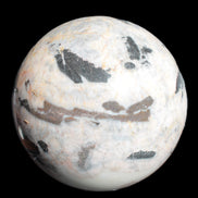 Big Zebra Stone sphere 147mm 4780g in sunlight - Rocks and Things Store