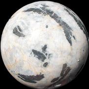 Big Zebra Stone sphere 147mm 4780g in sunlight - Rocks and Things Store
