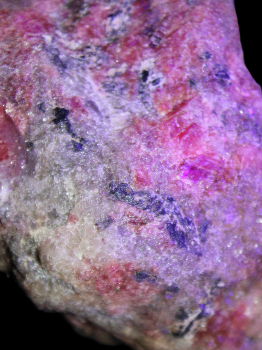 Natural Rhodonite specimen 120*81*50mm 700g in UV light - Rocks and Things Store