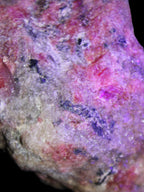 Natural Rhodonite specimen 120*81*50mm 700g in UV light - Rocks and Things Store