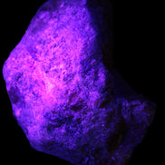 Natural Rhodonite specimen 120*81*50mm 700g in UV light - Rocks and Things Store