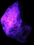 Natural Rhodonite specimen 120*81*50mm 700g in UV light - Rocks and Things Store