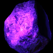 Natural Rhodonite specimen 120*81*50mm 700g in UV light - Rocks and Things Store