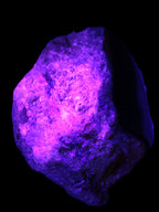 Natural Rhodonite specimen 120*81*50mm 700g in UV light - Rocks and Things Store