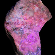 Natural Rhodonite specimen 120*81*50mm 700g in UV light - Rocks and Things Store