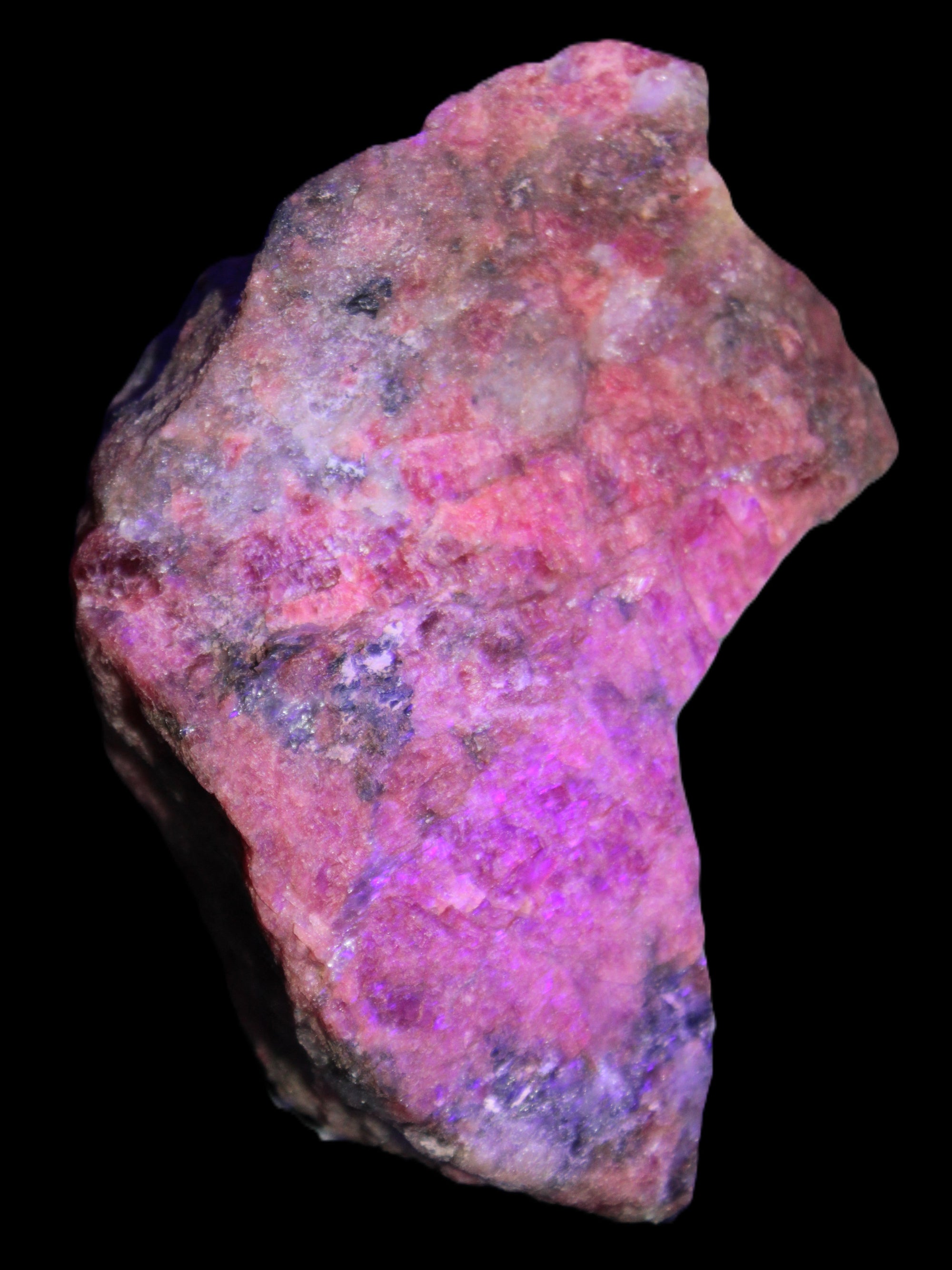 Natural Rhodonite specimen 120*81*50mm 700g in UV light - Rocks and Things Store