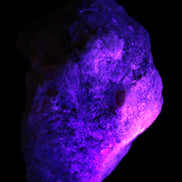 Natural Rhodonite specimen 120*81*50mm 700g in UV light - Rocks and Things Store