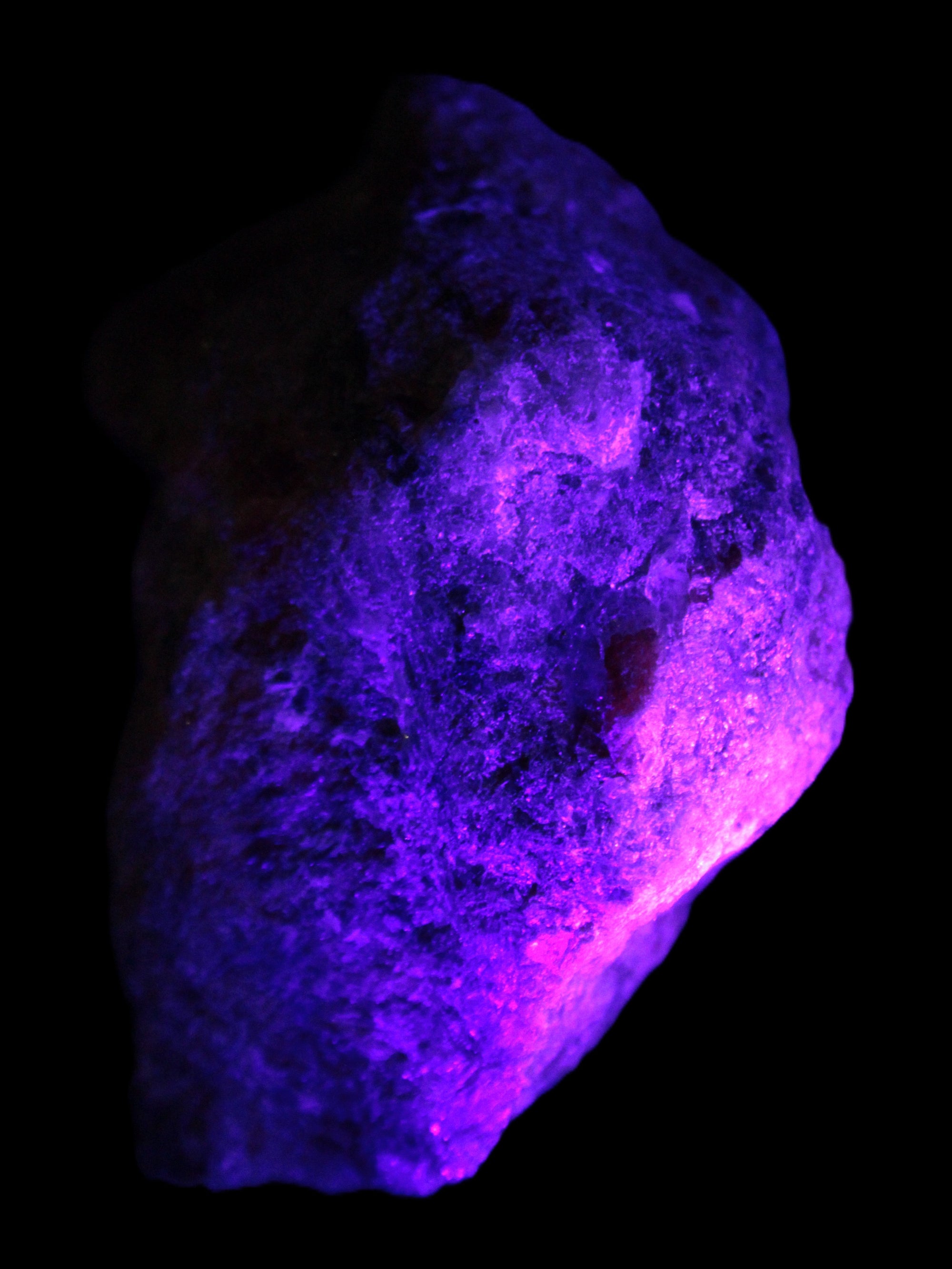 Natural Rhodonite specimen 120*81*50mm 700g in UV light - Rocks and Things Store