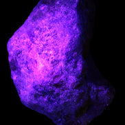 Natural Rhodonite specimen 120*81*50mm 700g in UV light - Rocks and Things Store