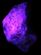 Natural Rhodonite specimen 120*81*50mm 700g in UV light - Rocks and Things Store