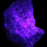 Natural Rhodonite specimen 120*81*50mm 700g in UV light - Rocks and Things Store