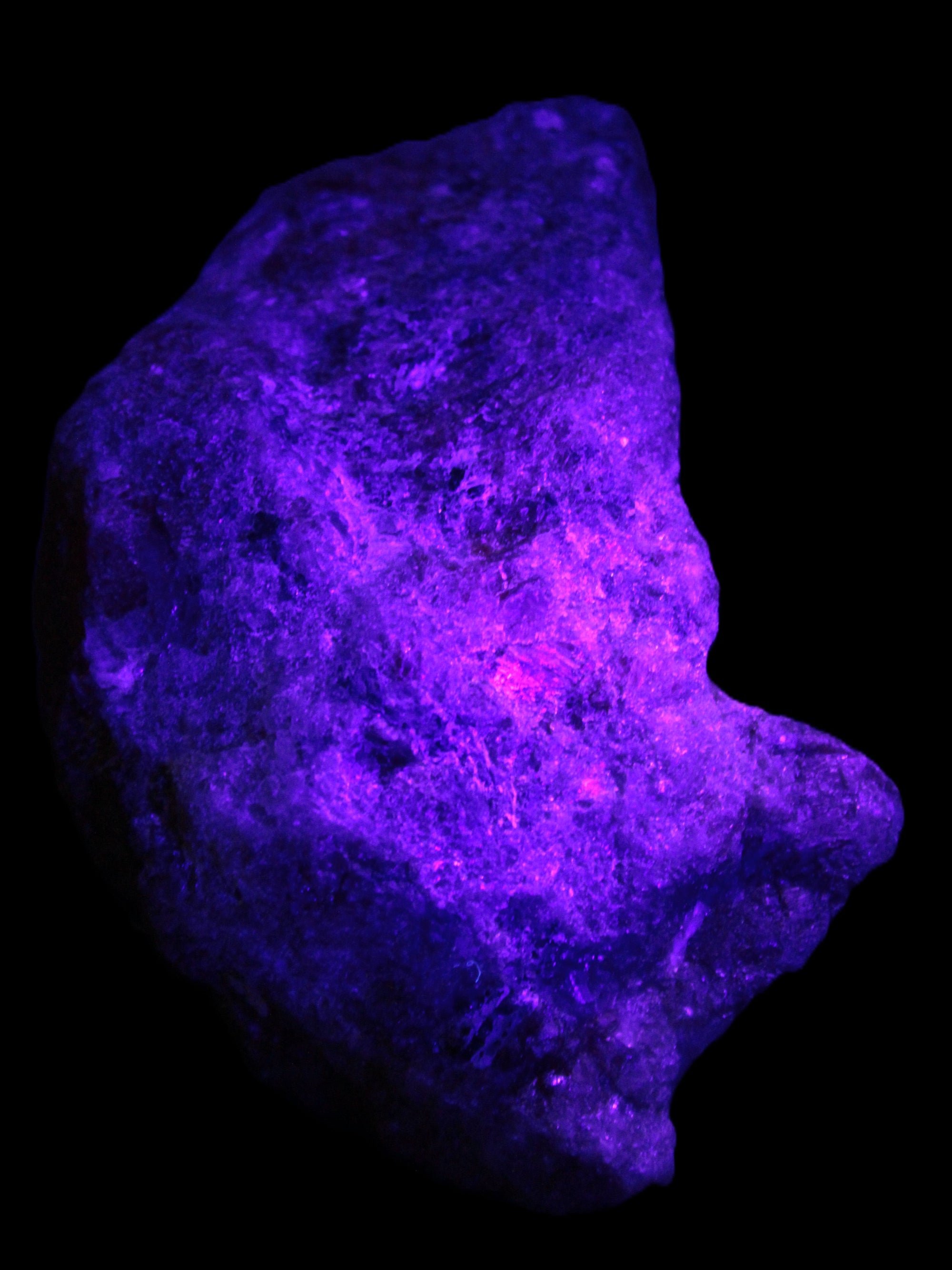 Natural Rhodonite specimen 120*81*50mm 700g in UV light - Rocks and Things Store