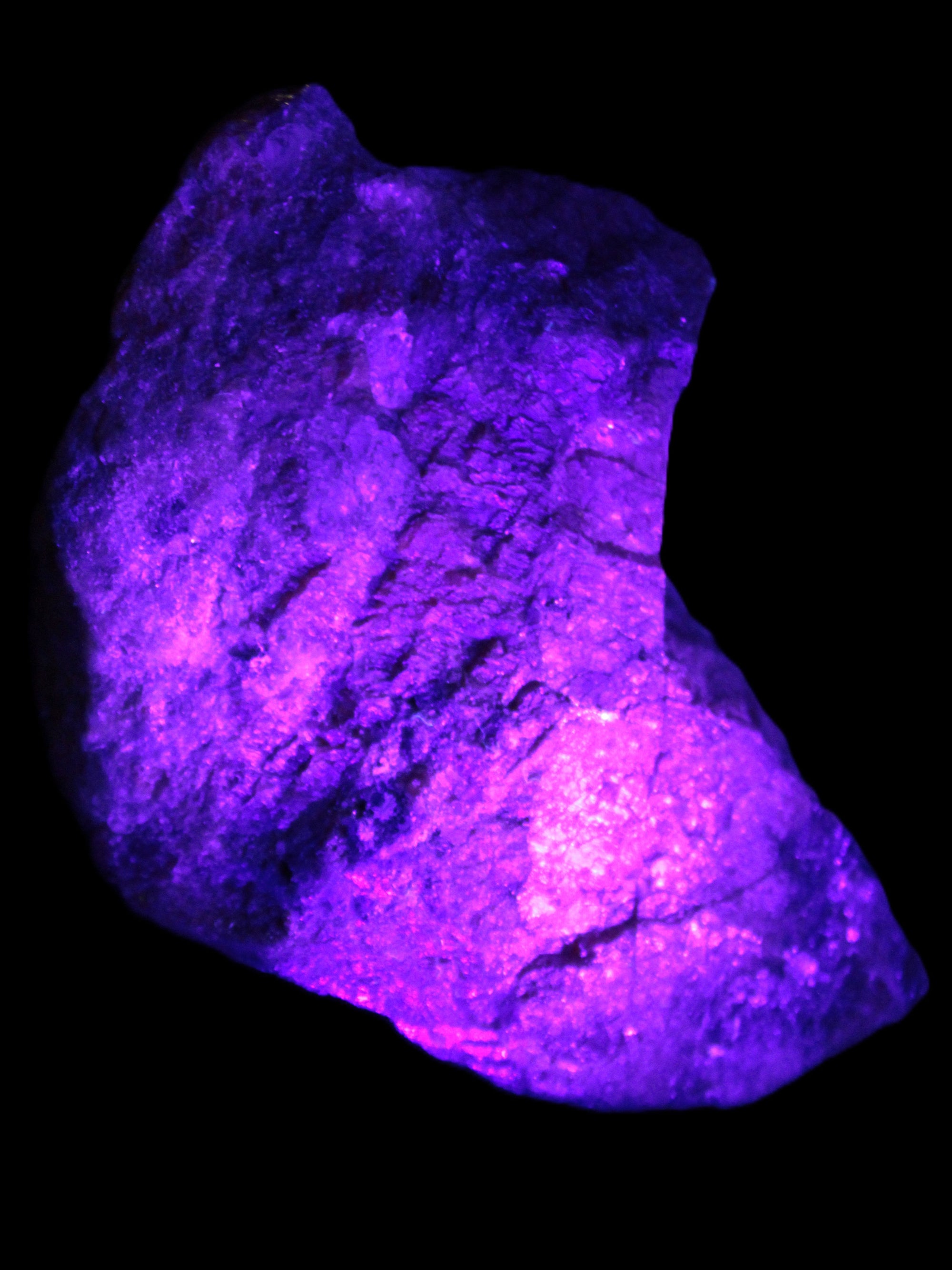 Natural Rhodonite specimen 120*81*50mm 700g in UV light - Rocks and Things Store